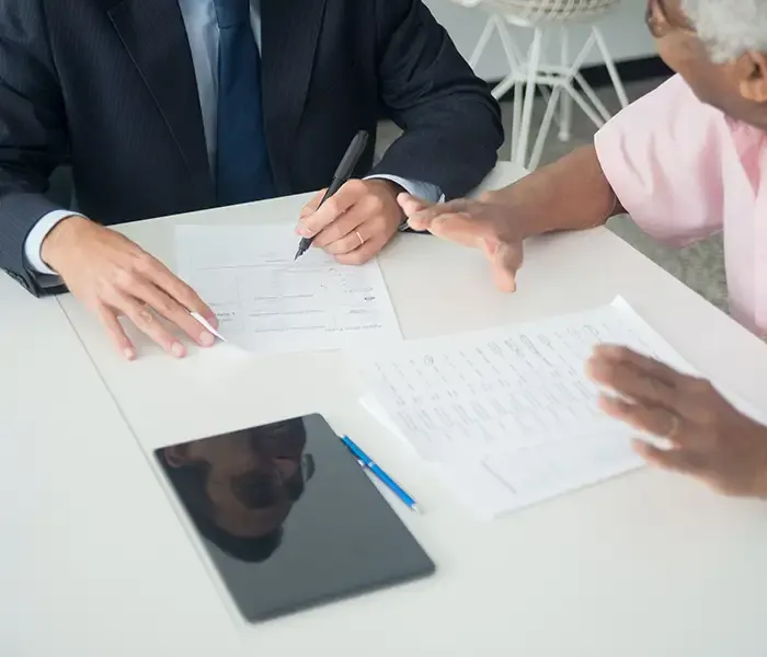 insurance agent with senior citizen